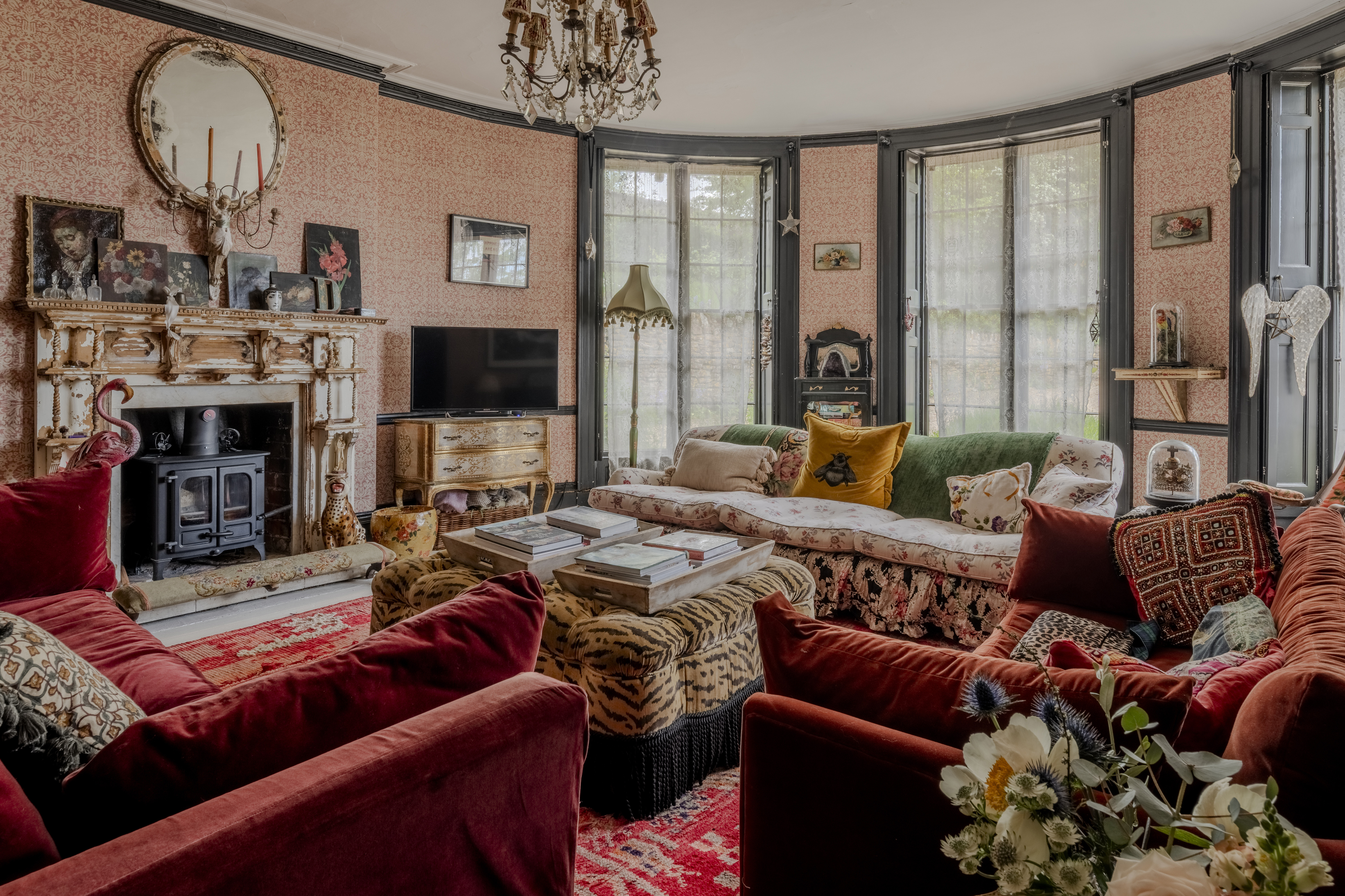 Living room showcasing eclectic decor and furnishings.